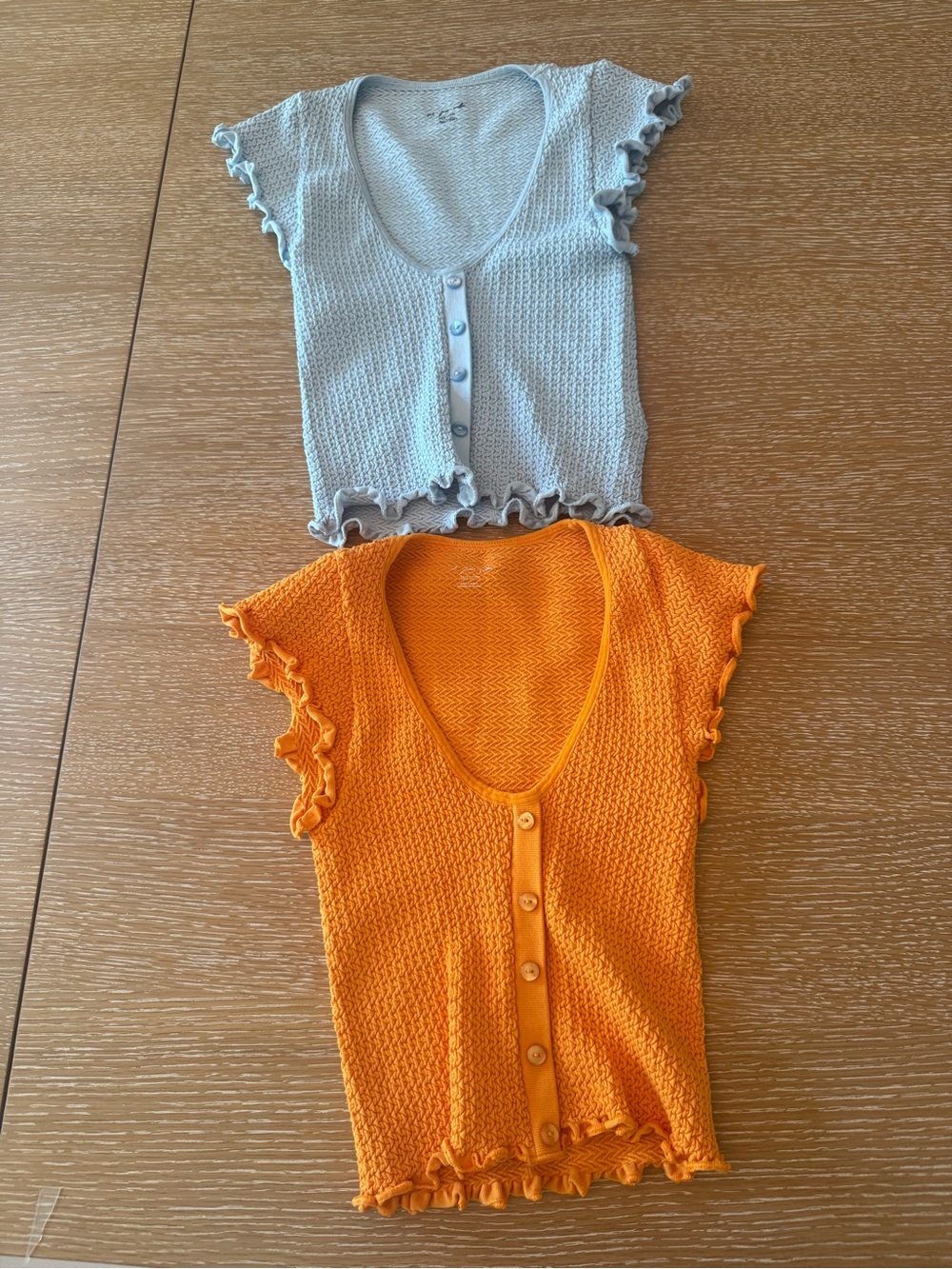 Urban Outfitters Light Blue & Bright Orange Ruffle Button Crop Tops. Worn 2 time